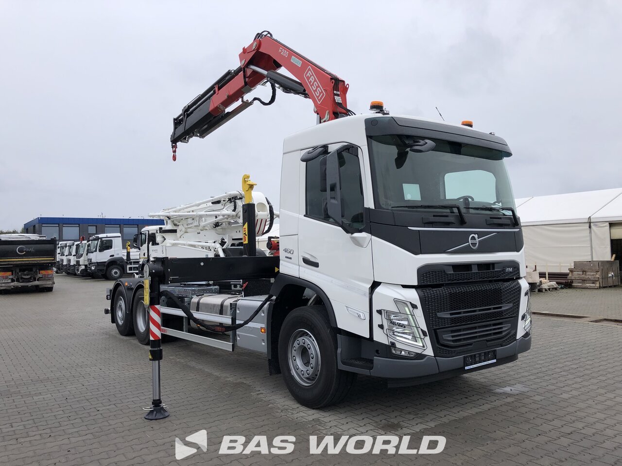 Front right : Volvo FM 460 6X2 Hyva 20-57S kroghejs lastbil