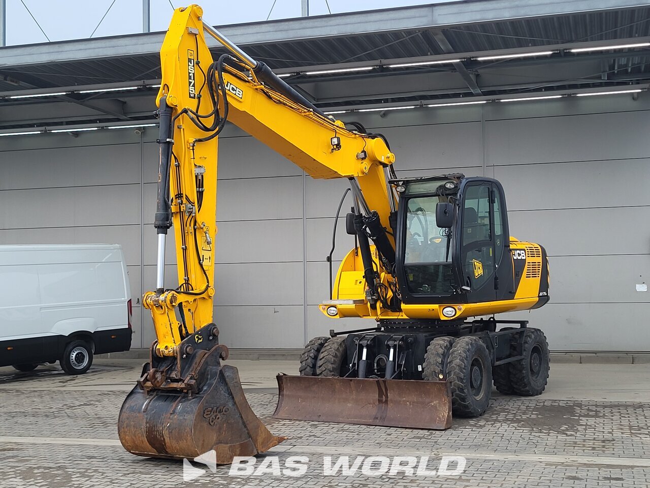 Front left : JCB Gravemaskine på hjul