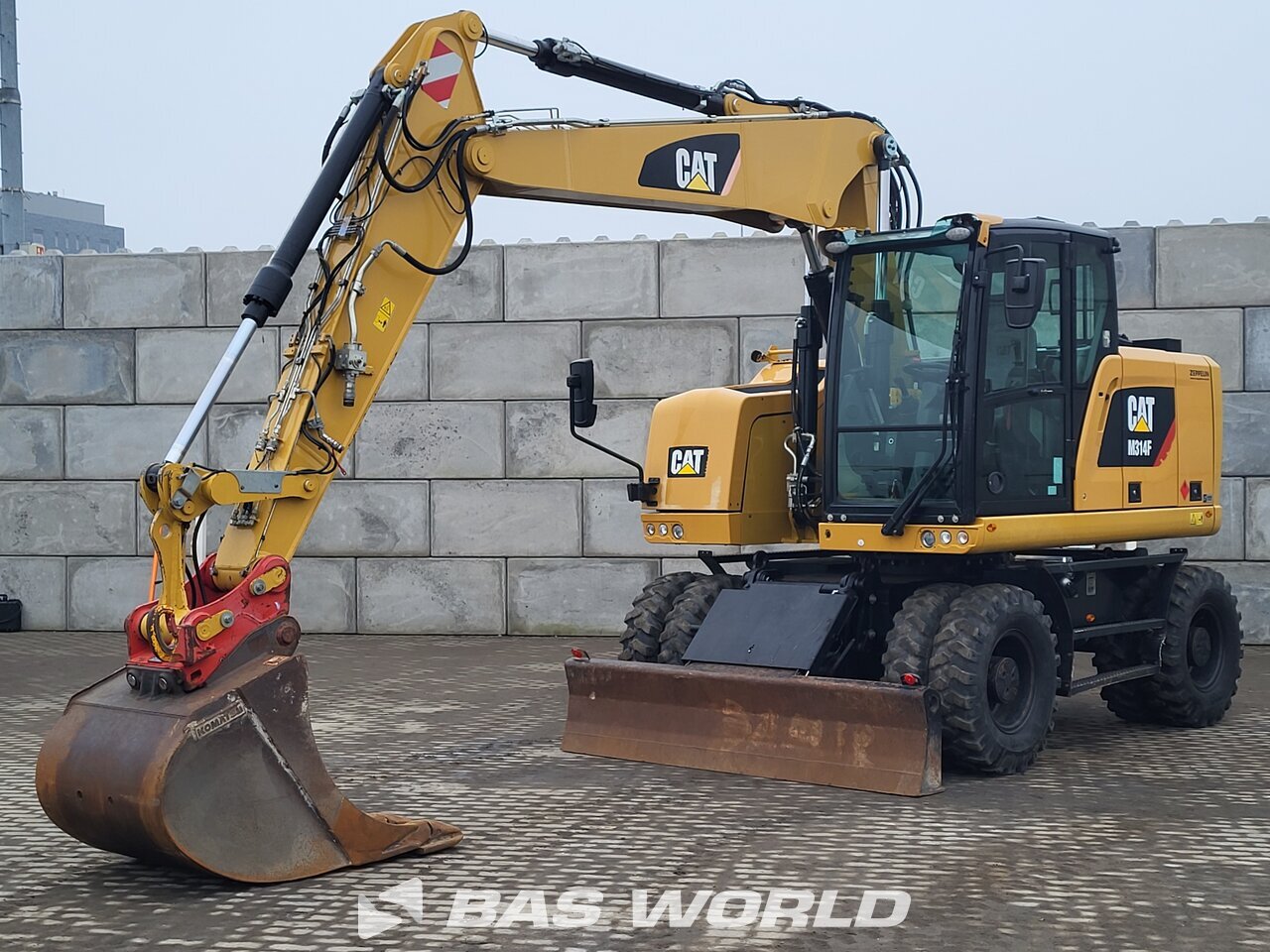 Front left : Caterpillar M314 F Pelle sur pneus
