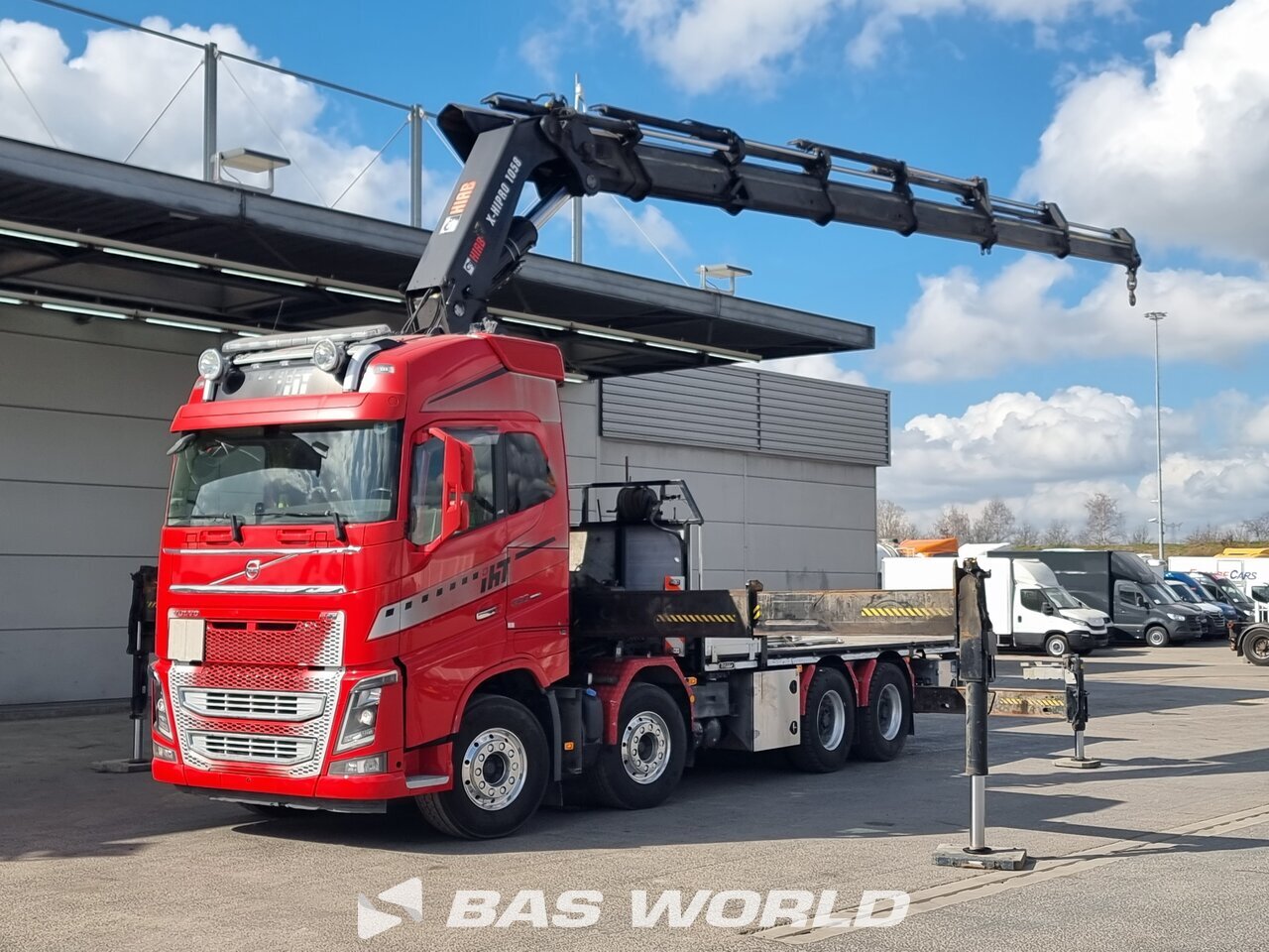 Front left : Volvo FH16 650 8X4 Tyllis Camion plateaux