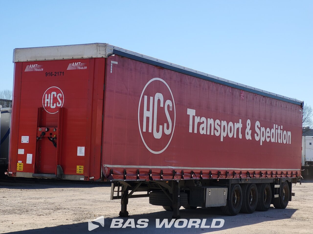 Front left : AMT Trailer Semi-remorques rideaux coulissants