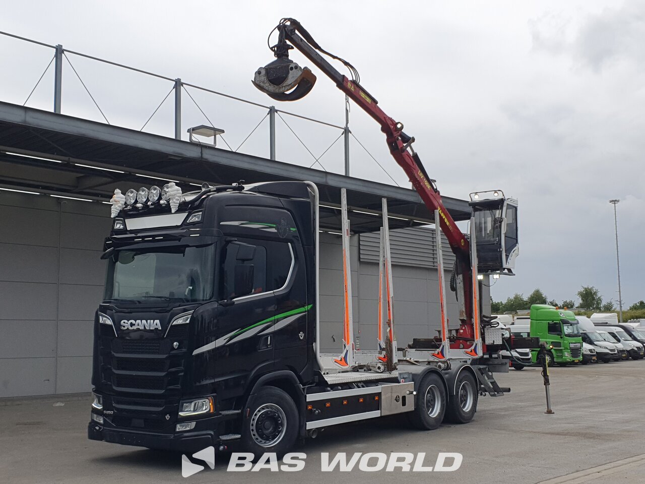 Front left : Scania S650 6X4 OP hoglunds type: Timmerbil Grumier